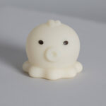 Veilleuse en silicone crème en forme de pieuvre, petite lampe aux yeux noirs, fini mat