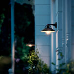 Applique murale extérieure en métal noir, globe en verre transparent et bras coudé, éclairage d'entrée