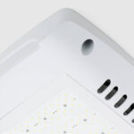 Plafonnier LED rectangulaire blanc, panneau LED apparent et grilles de ventilation